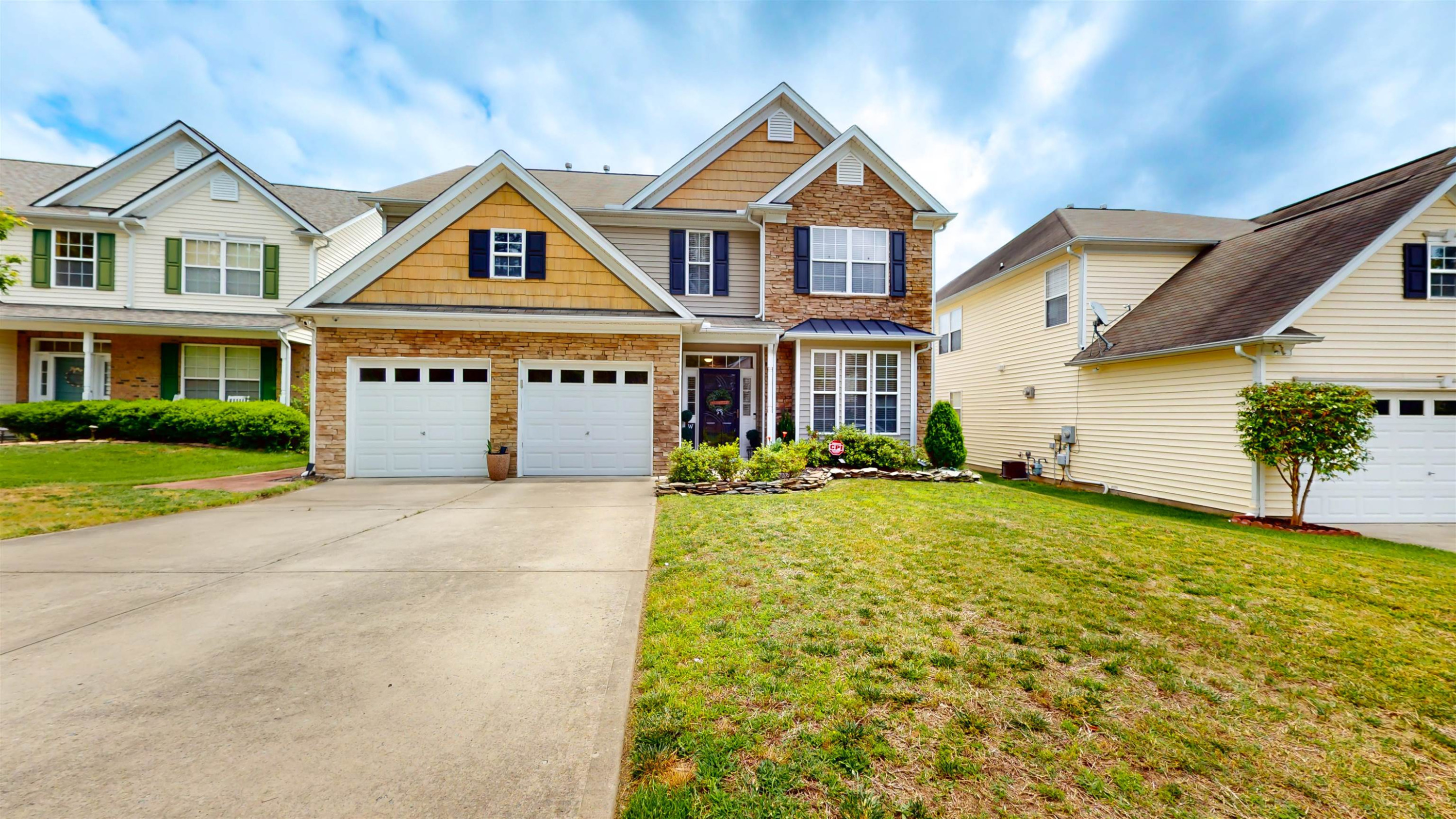 front view of house with a yard