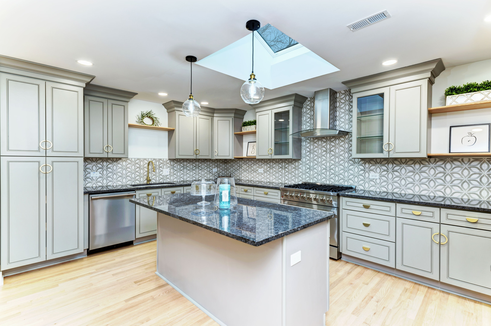 5927 Brookbank Road Downers Grove, IL 60516 - Photo 11 of 38 a kitchen with stainless steel appliances granite countertop a sink a stove and a wooden cabinets