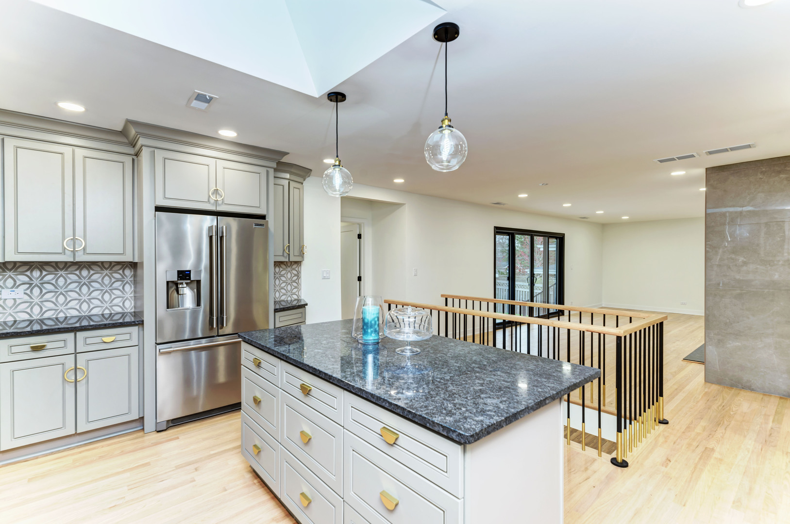 5927 Brookbank Road Downers Grove, IL 60516 - Photo 14 of 38 a kitchen with stainless steel appliances granite countertop a sink a refrigerator and a granite counter tops