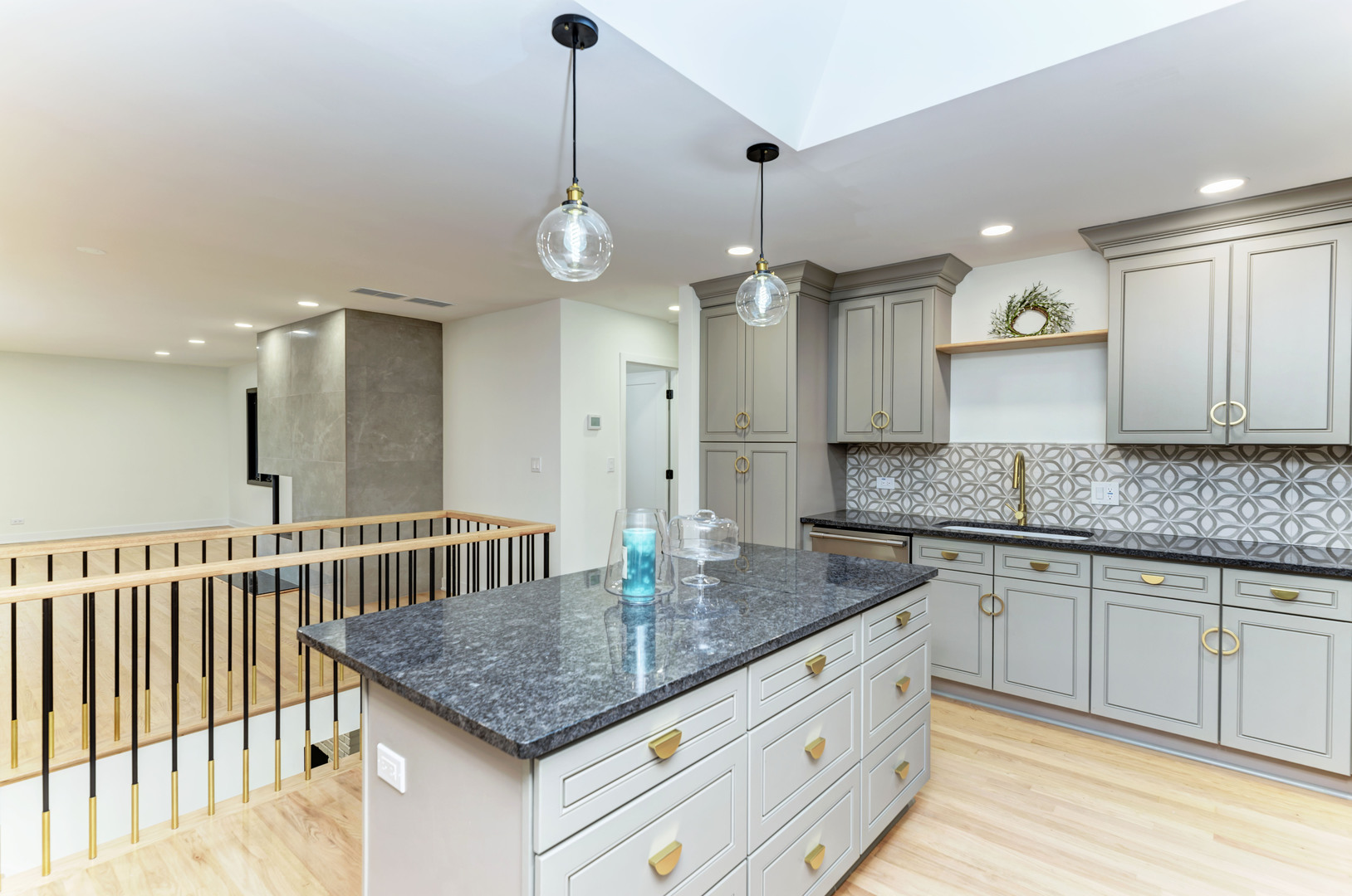 5927 Brookbank Road Downers Grove, IL 60516 - Photo 15 of 38 a kitchen with stainless steel appliances granite countertop a sink a refrigerator and a granite counter tops