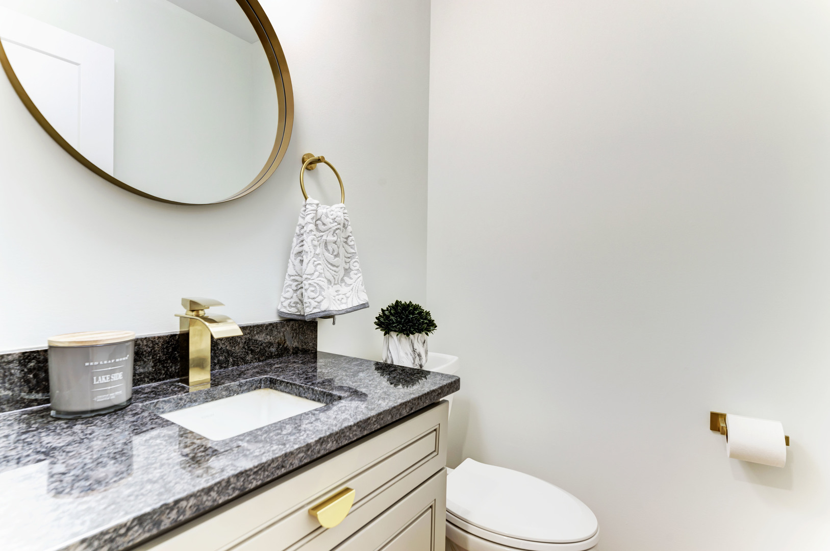 5927 Brookbank Road Downers Grove, IL 60516 - Photo 16 of 38 a bathroom with a granite countertop toilet sink and mirror