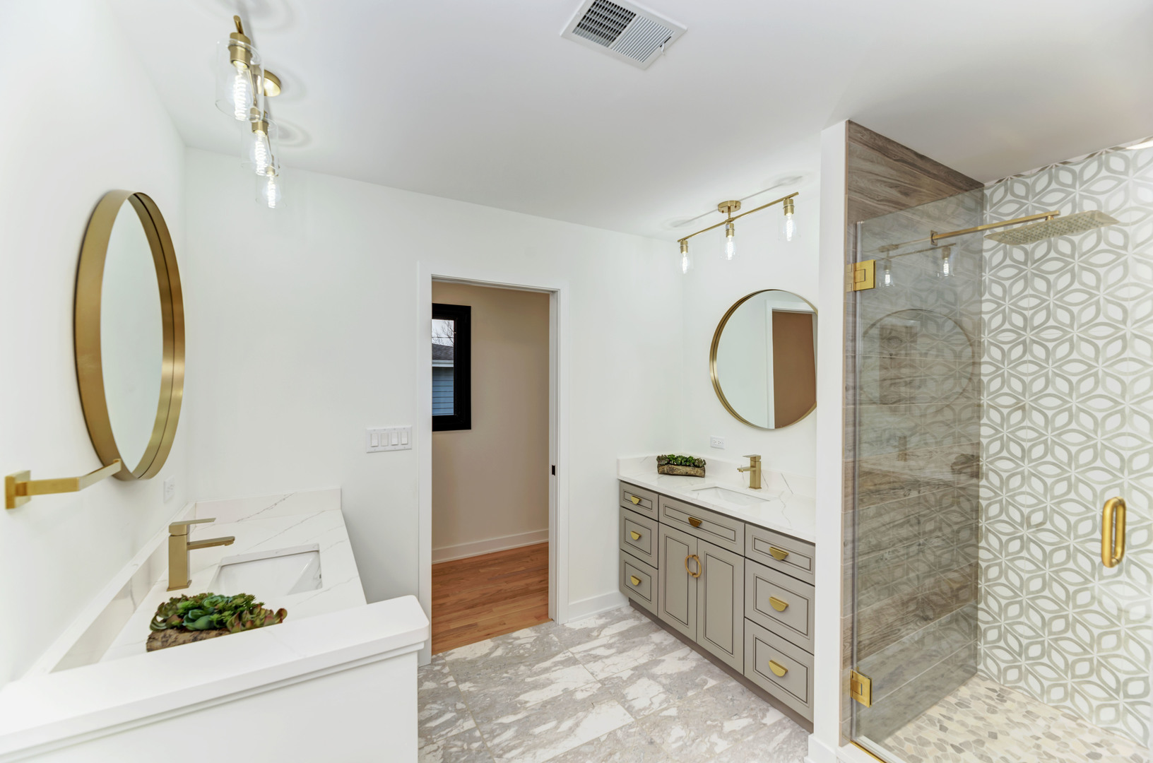 5927 Brookbank Road Downers Grove, IL 60516 - Photo 20 of 38 a bathroom with a mirror a sink and a mirror