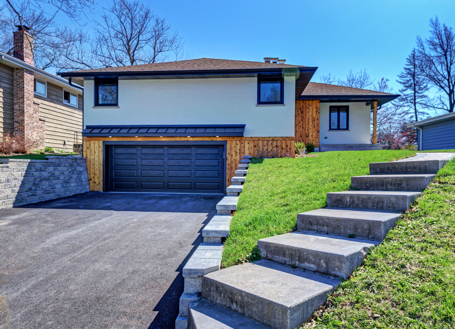 5927 Brookbank Road Downers Grove, IL 60516 - Photo 2 of 38 a front view of a house with a yard