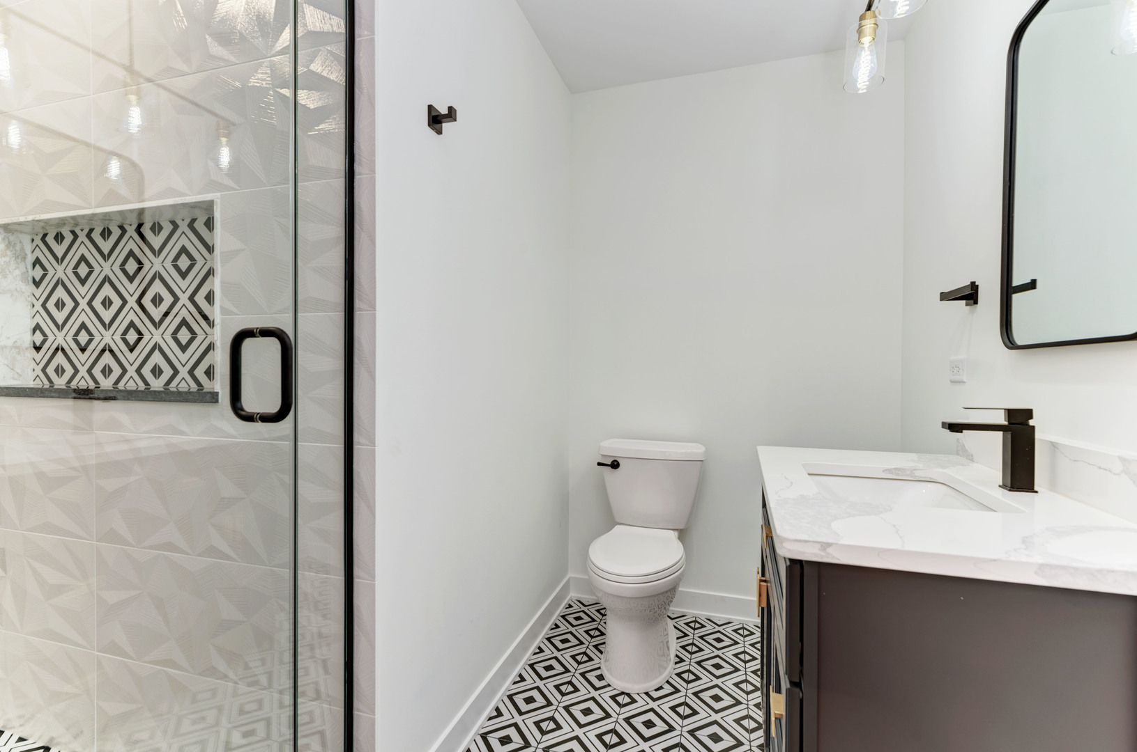 5927 Brookbank Road Downers Grove, IL 60516 - Photo 24 of 38 a bathroom with a toilet sink and mirror