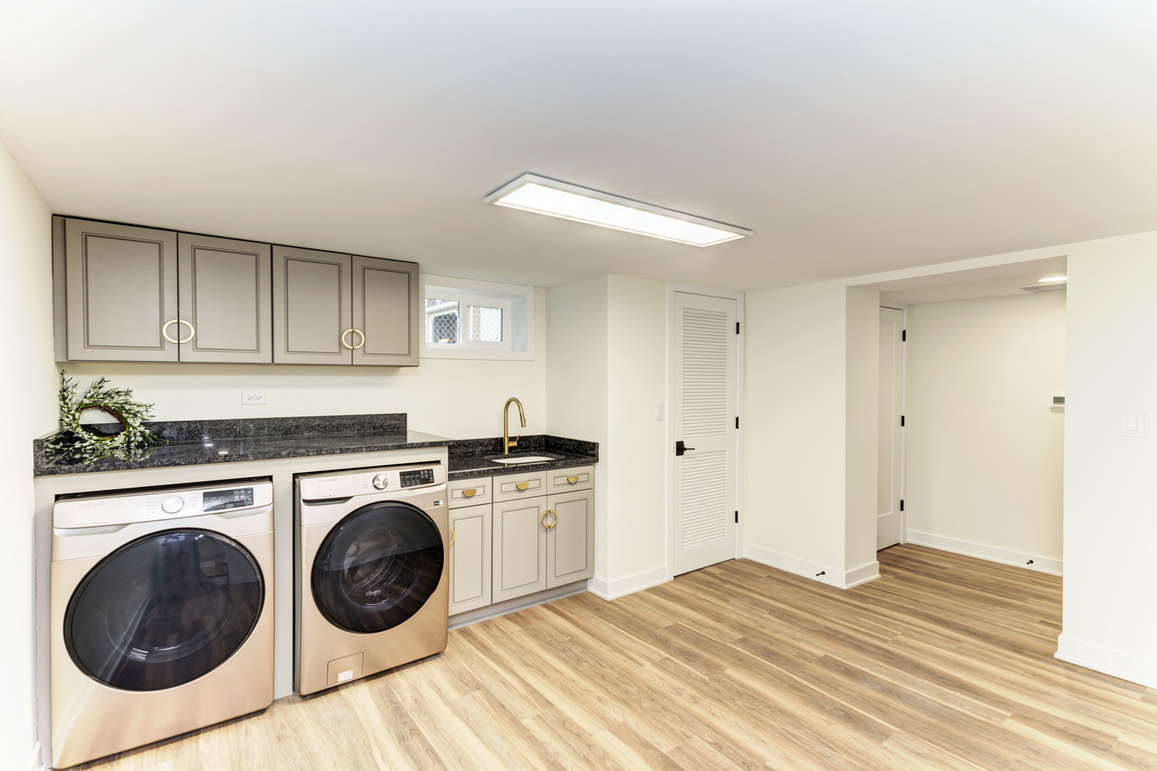 5927 Brookbank Road Downers Grove, IL 60516 - Photo 30 of 38 a kitchen with a stove top oven sink and cabinets