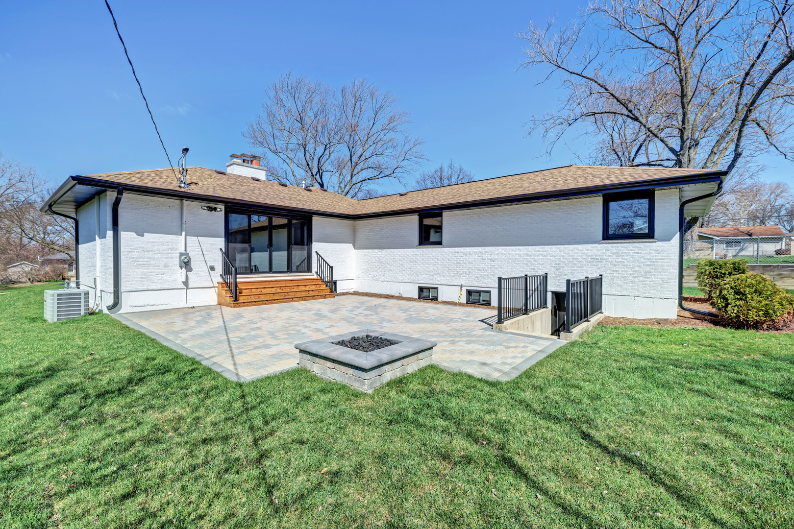 5927 Brookbank Road Downers Grove, IL 60516 - Photo 37 of 38 a backyard of a house with barbeque oven table and chairs