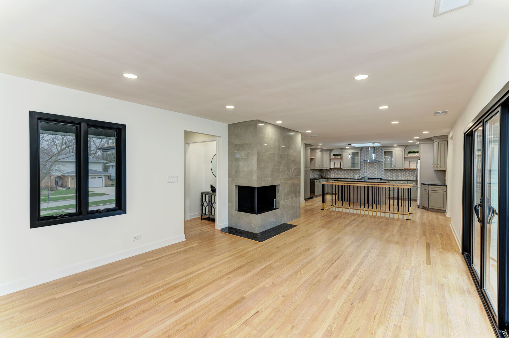5927 Brookbank Road Downers Grove, IL 60516 - Photo 6 of 38 a view of a living room a refrigerator and wooden floor