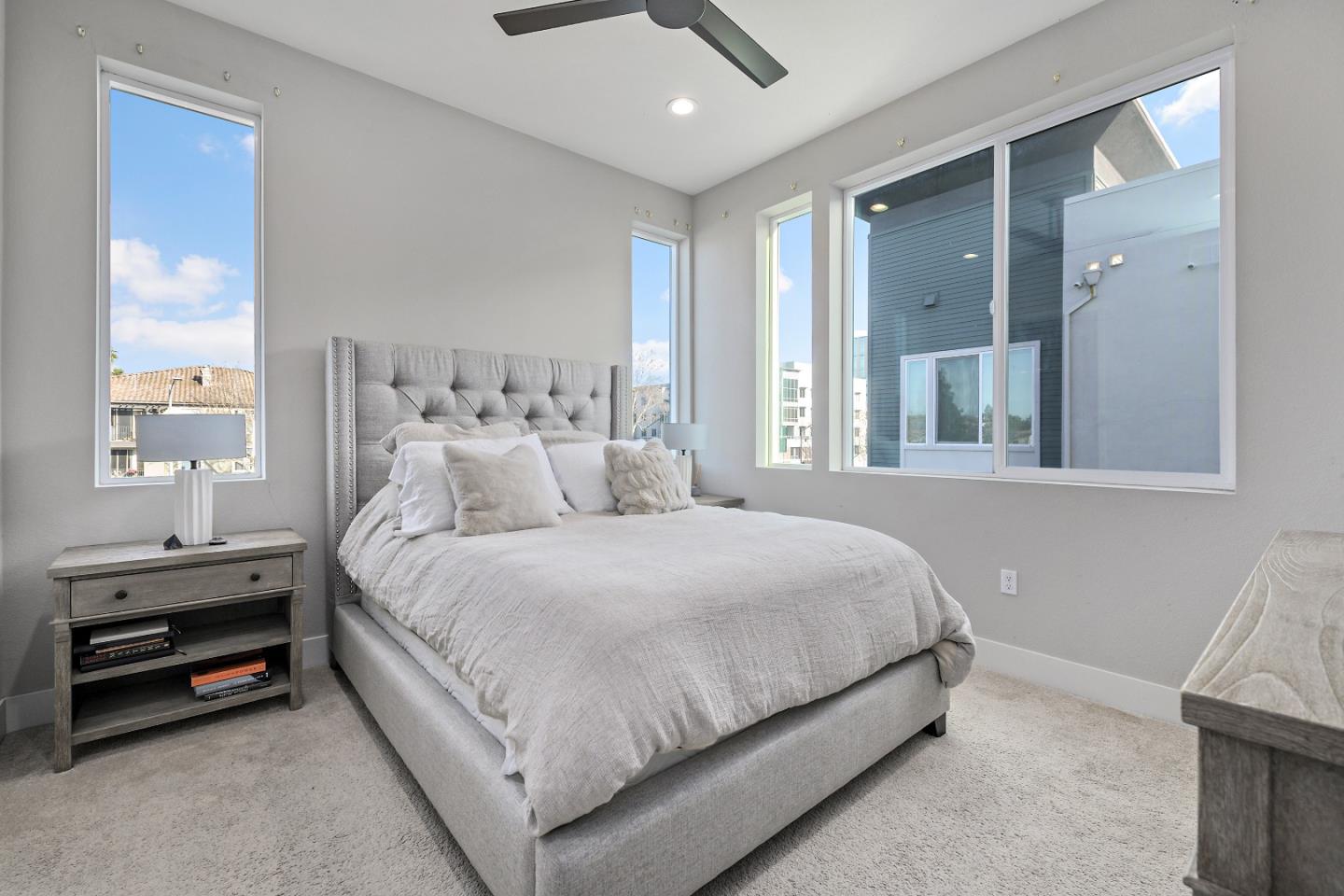 162 Nexus Loop San Jose, CA 95110 - Photo 15 of 19 a bedroom with a bed and a window