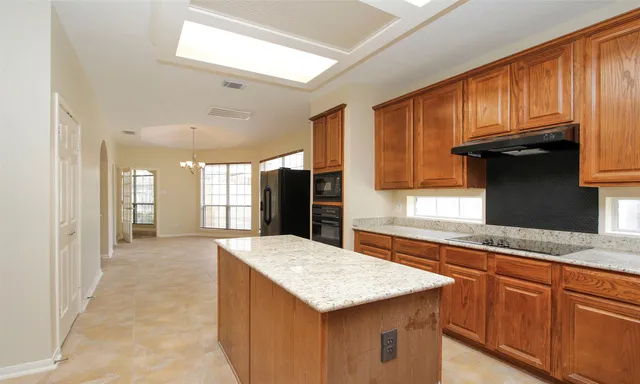 a bathroom with a sink a vanity and a mirror