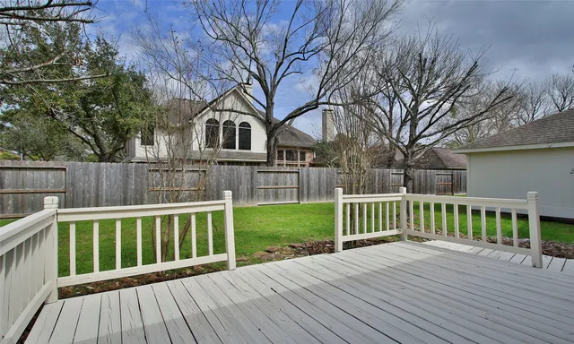 a view of a wooden roof deck
