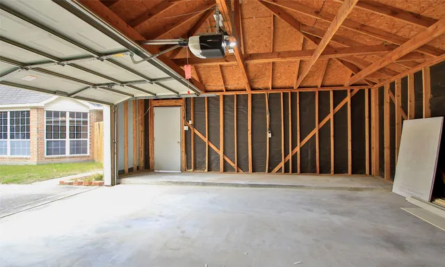 a view of a room with wooden walls