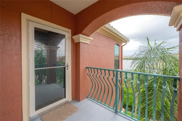 a view of balcony with small garden