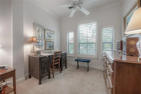 a bedroom with a bed and furniture