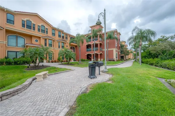 a view of a water fountain and an outdoor space