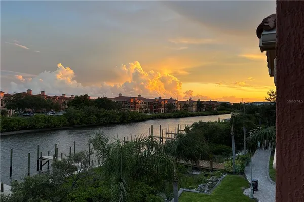 a view of lake with green space