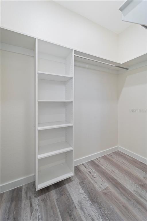 3299 Pinetree Street Port Charlotte, FL 33952 - Photo 6 of 6 a view of a room with shelf on the wall