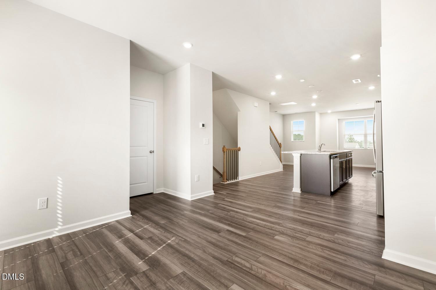 146 Zealand Court Raleigh, NC 27610 - Photo 17 of 45 a view of a living room with wooden floor
