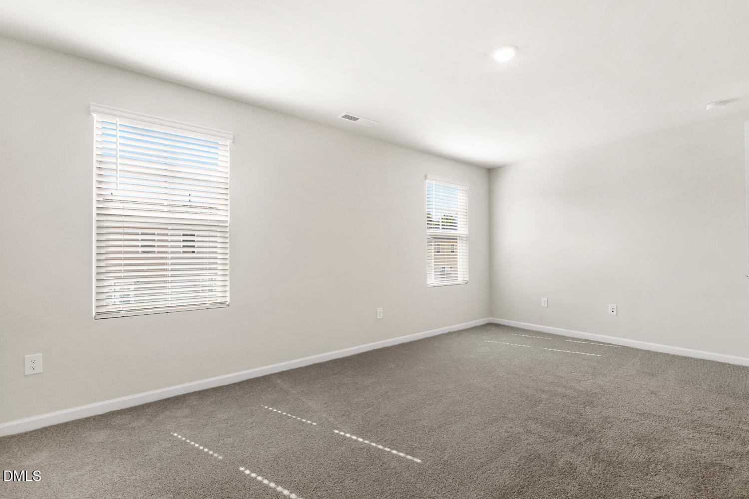 146 Zealand Court Raleigh, NC 27610 - Photo 29 of 45 an empty room with a window