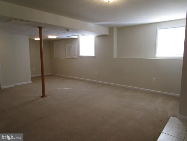 a bathroom with a sink a toilet and a shower