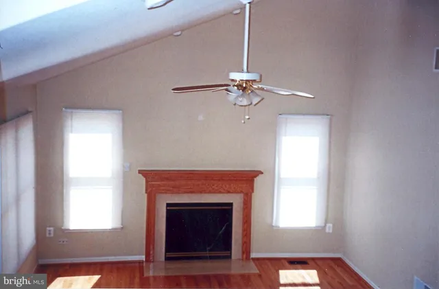 a kitchen with a sink a stove and cabinets