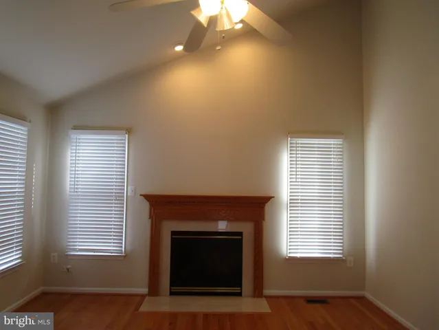 a kitchen with a sink stove and microwave