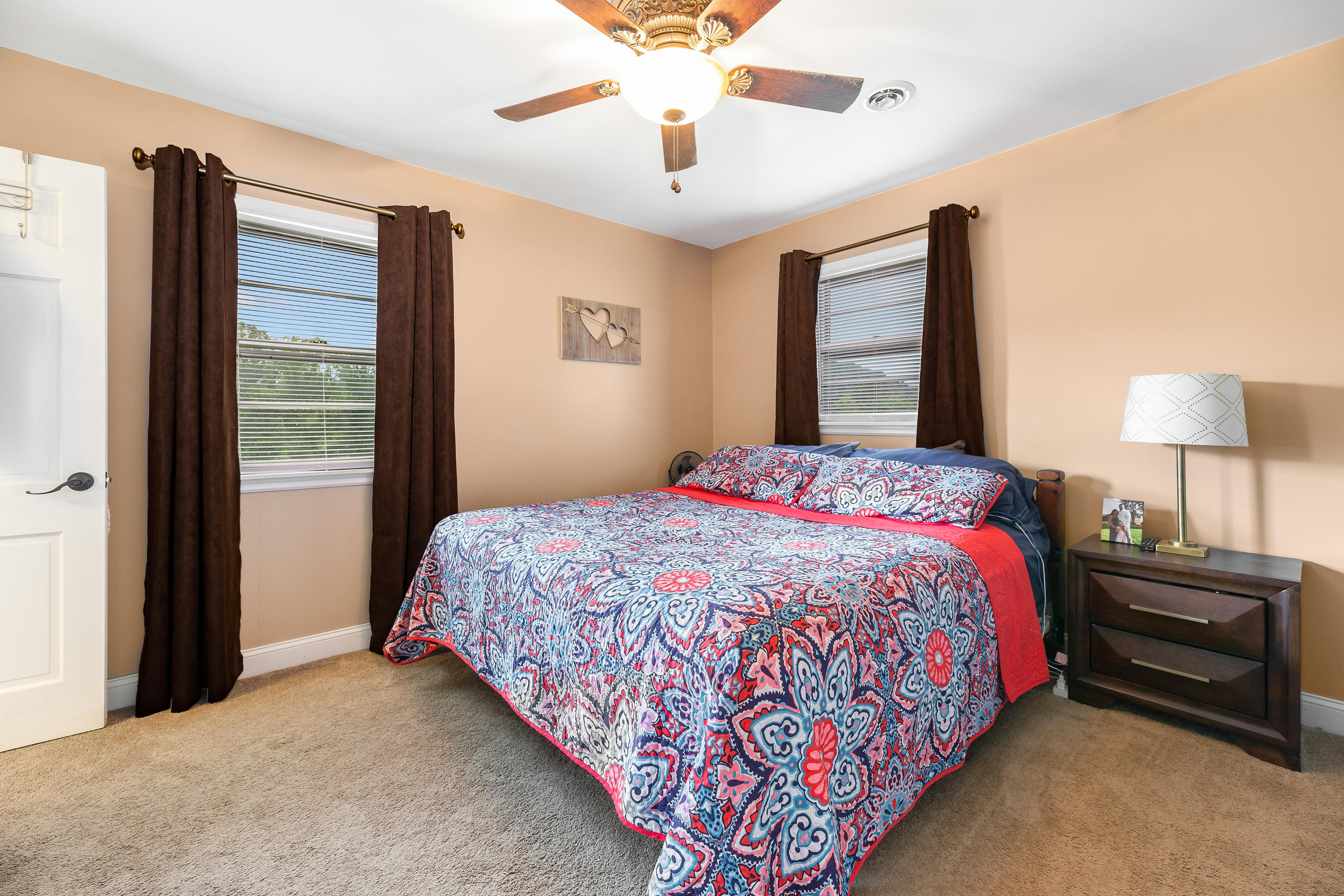 6543 Goodview Road Goodview, VA 24095 - Photo 12 of 21 a bedroom with a bed and a window
