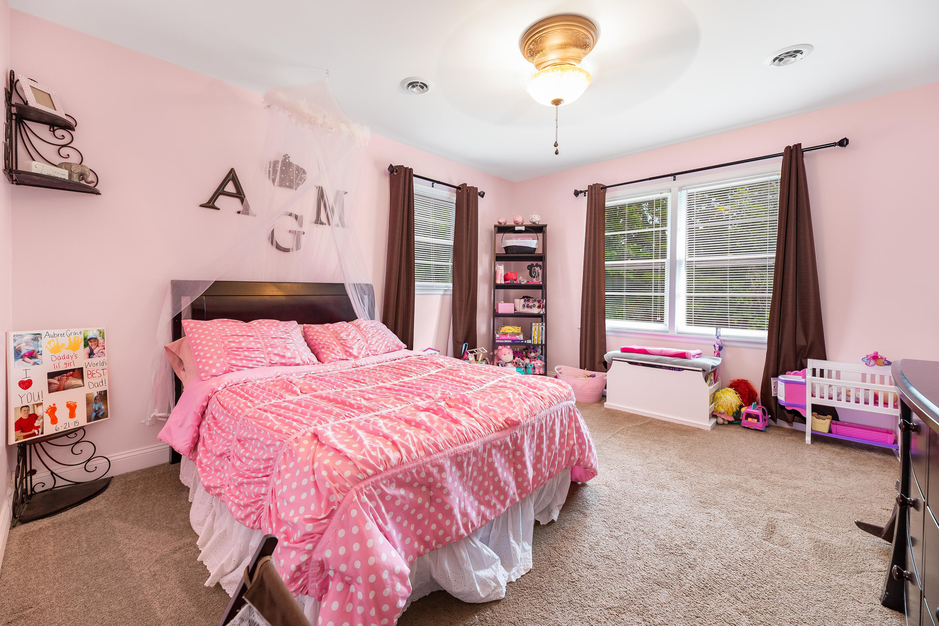 6543 Goodview Road Goodview, VA 24095 - Photo 15 of 21 a bedroom with a bed and a large window