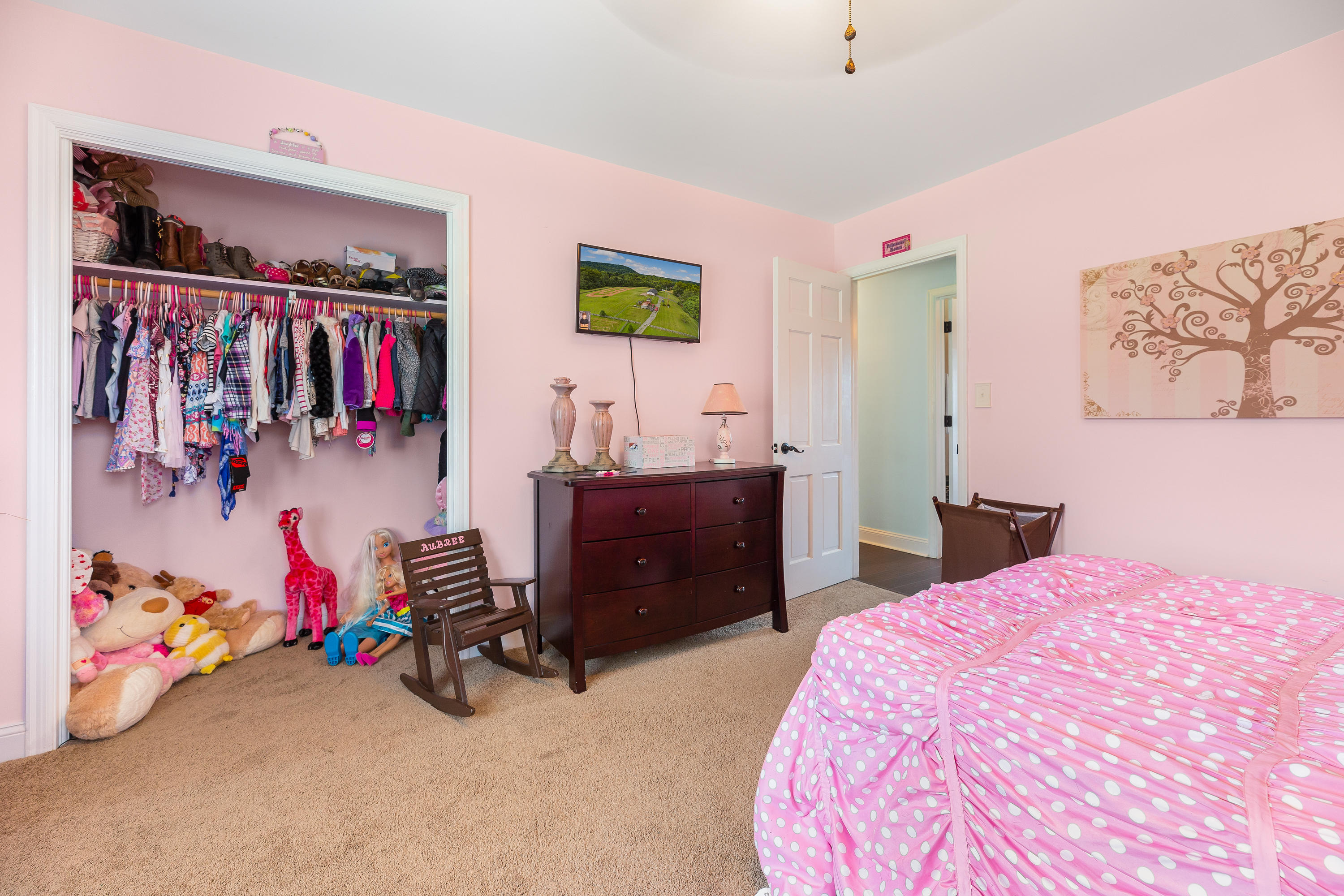 6543 Goodview Road Goodview, VA 24095 - Photo 16 of 21 a bedroom with a bed and a table