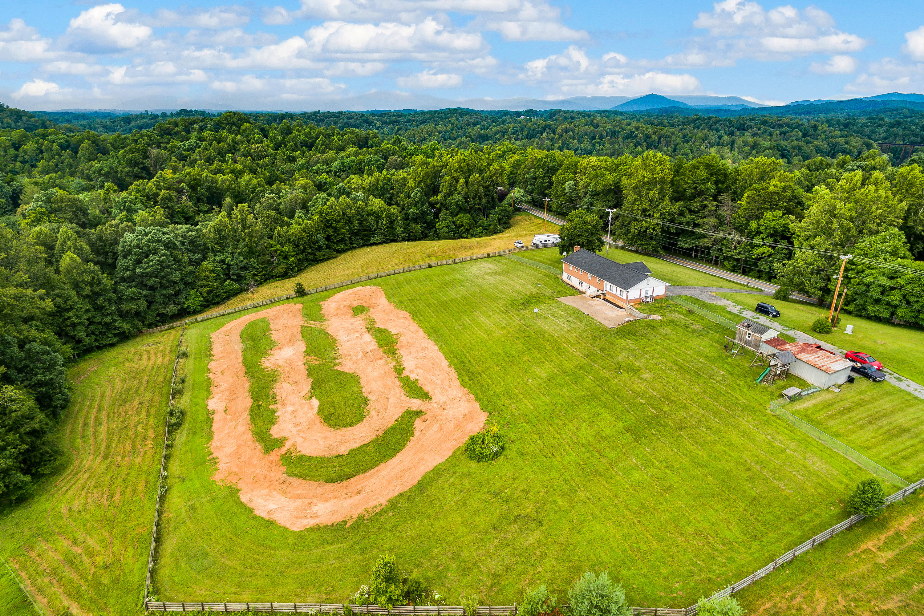 6543 Goodview Road Goodview, VA 24095 - Photo 4 of 21 a view of a swimming pool with a yard