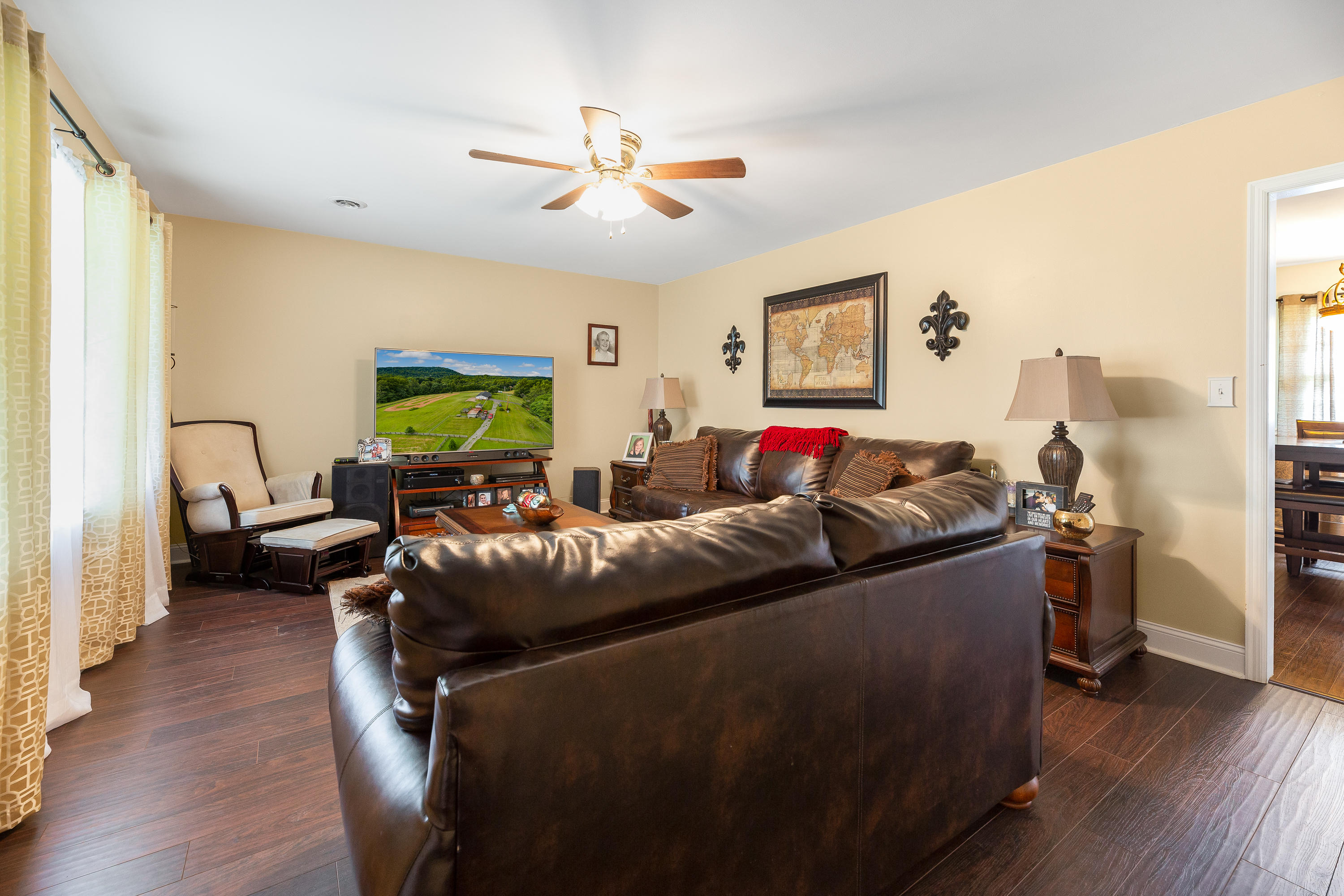 6543 Goodview Road Goodview, VA 24095 - Photo 5 of 21 a living room with furniture and a flat screen tv