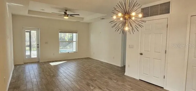 a view of livingroom with hardwood floor and window