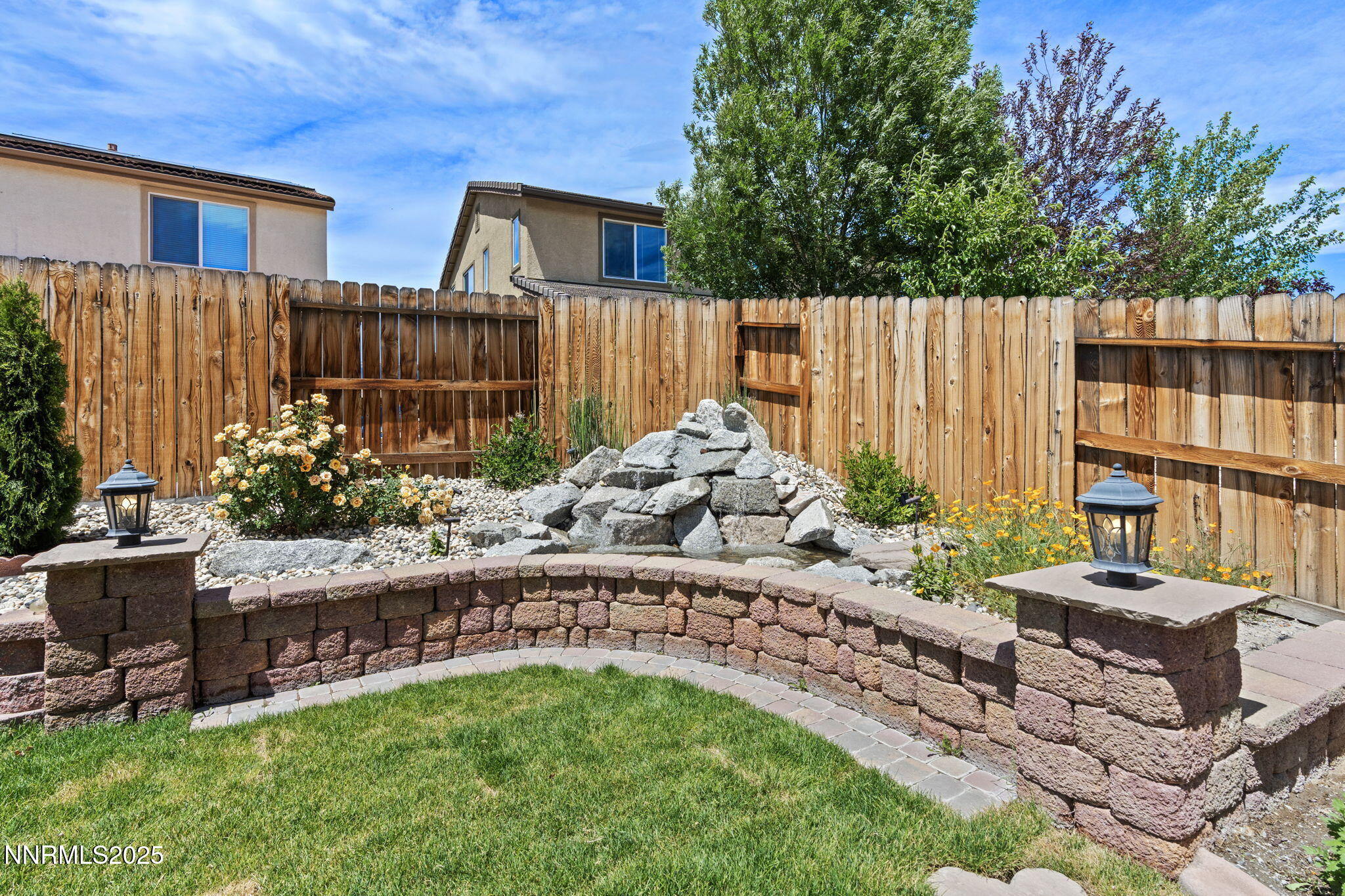 2028 Bayview Drive Reno, NV 89521 - Photo 28 of 33 a view of a backyard with plants and outdoor seating
