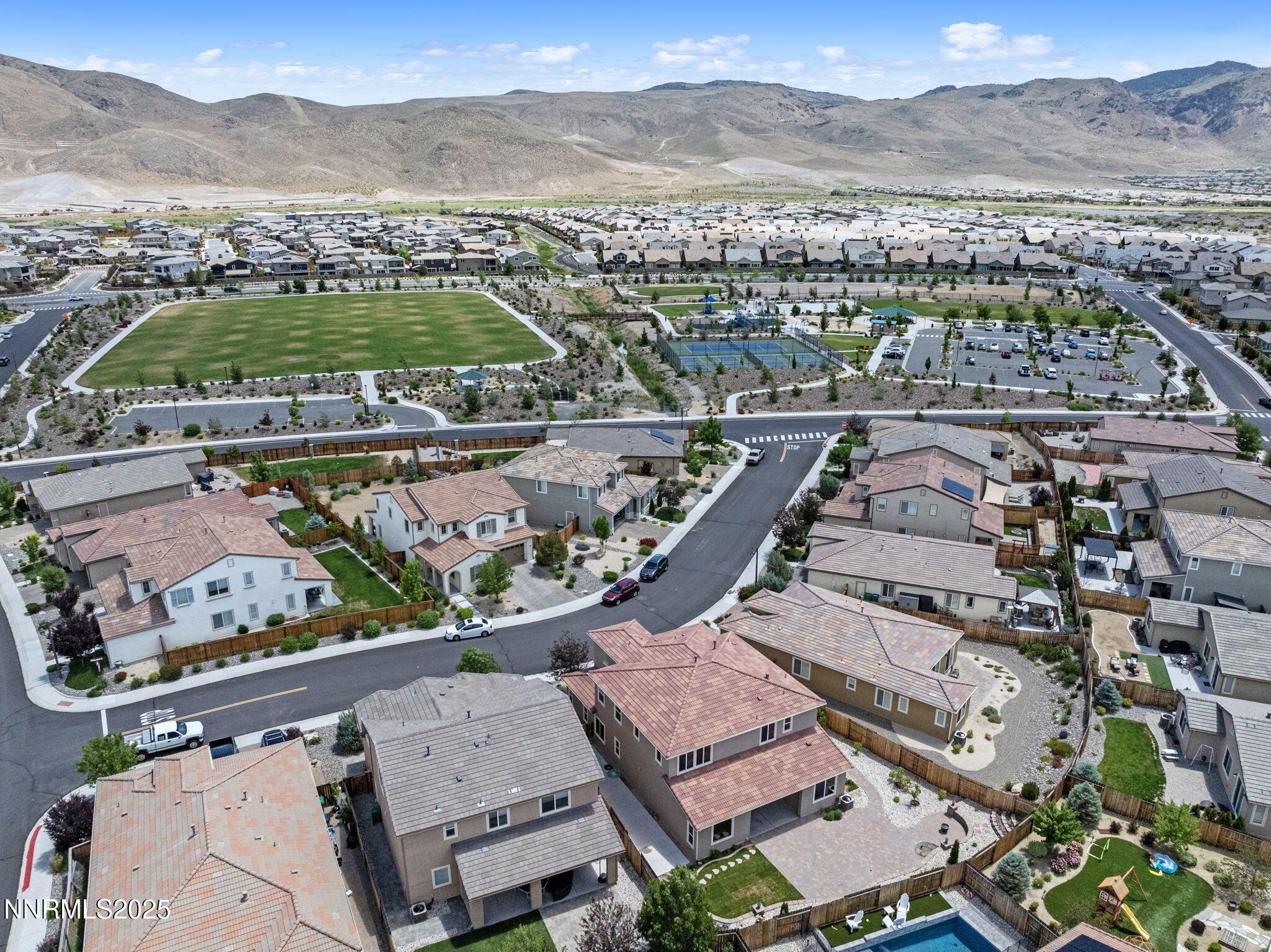 2028 Bayview Drive Reno, NV 89521 - Photo 29 of 33 an aerial view of a city with lots of residential buildings ocean and mountain view in back