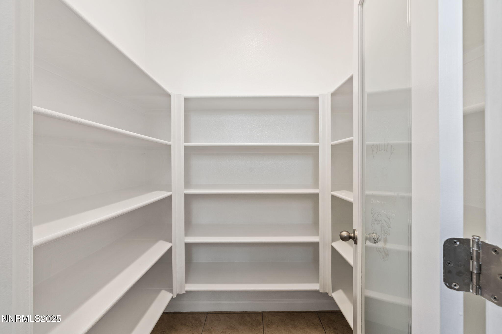 2028 Bayview Drive Reno, NV 89521 - Photo 5 of 33 a view of walk in closet with empty racks