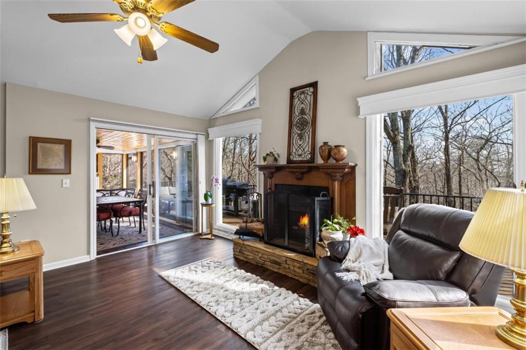 119 Soaring Hawk Circle Big Canoe, GA 30143 - Photo 12 of 50 a living room with furniture and a fireplace