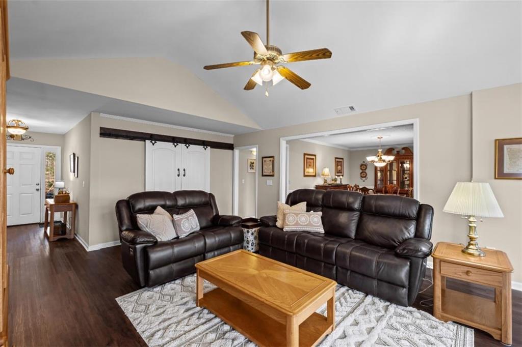 119 Soaring Hawk Circle Big Canoe, GA 30143 - Photo 13 of 50 a living room with furniture and wooden floor