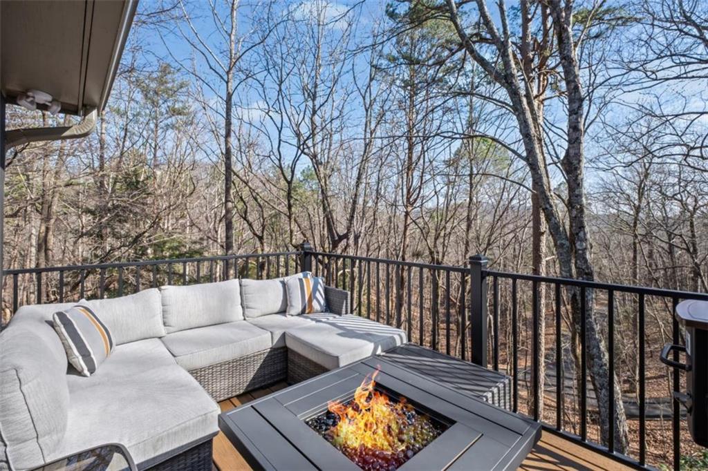 119 Soaring Hawk Circle Big Canoe, GA 30143 - Photo 4 of 50 a view of a couches in the roof deck