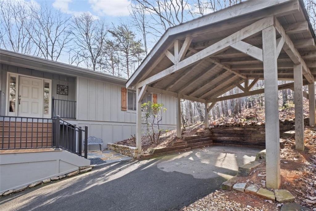 119 Soaring Hawk Circle Big Canoe, GA 30143 - Photo 6 of 50 a view of garage with car parked