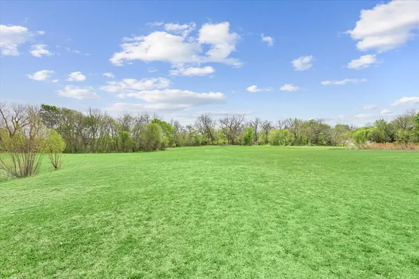 a view of an outdoor space and a yard
