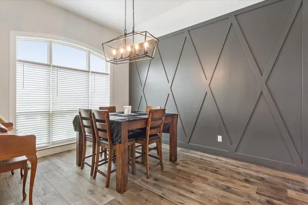 a view of a house with backyard and porch