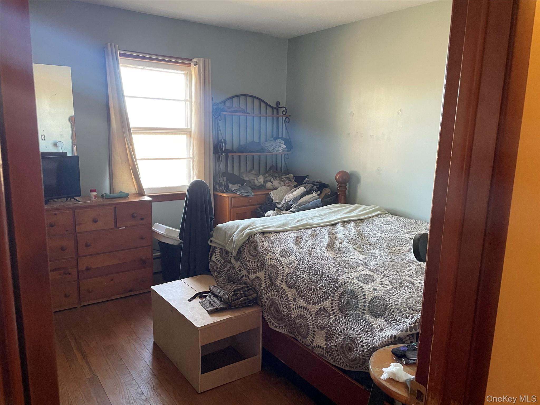 239 Rokeby Road Red Hook, NY 12572 - Photo 13 of 25 a bedroom with a bed and a window