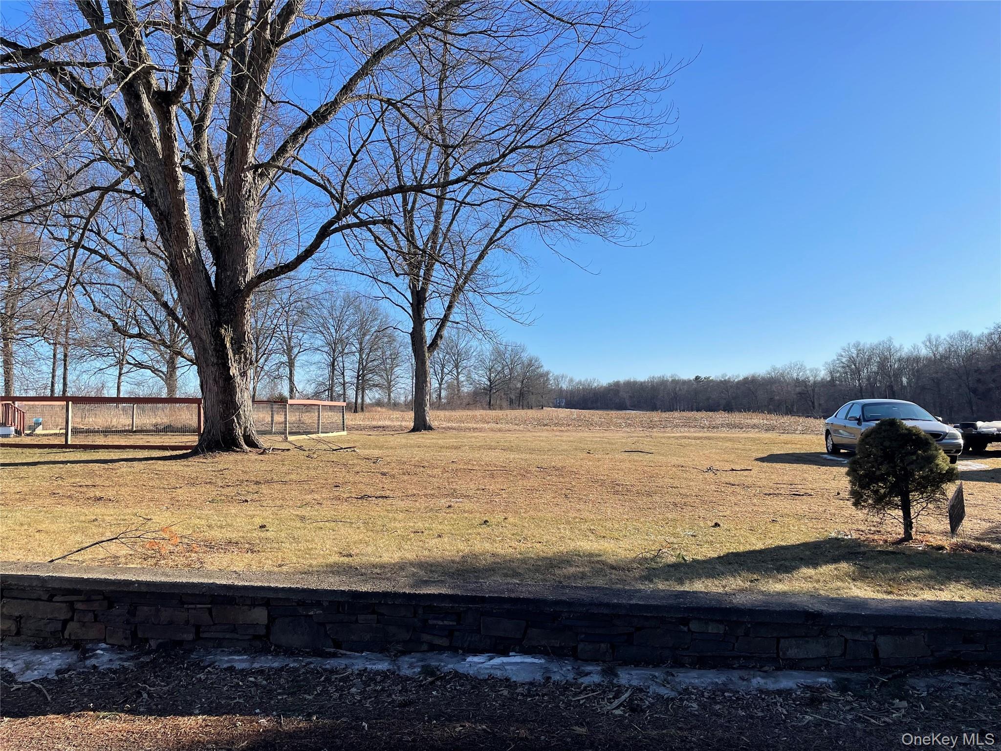 239 Rokeby Road Red Hook, NY 12572 - Photo 22 of 25 a view of a lake with a yard