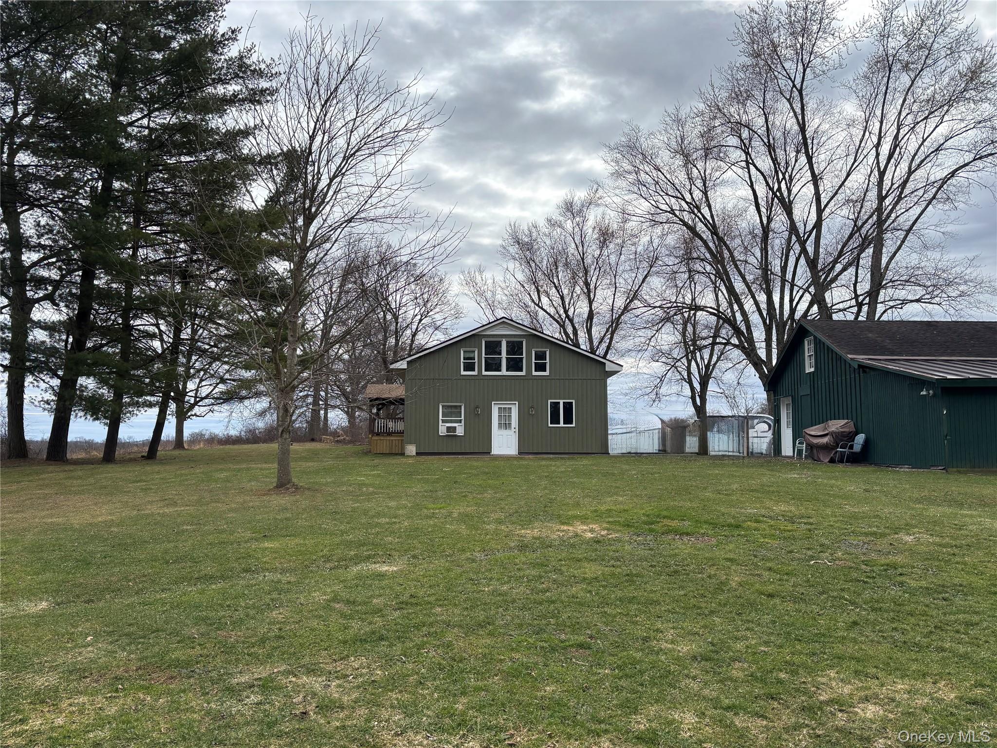 239 Rokeby Road Red Hook, NY 12572 - Photo 3 of 25 a front view of house with yard