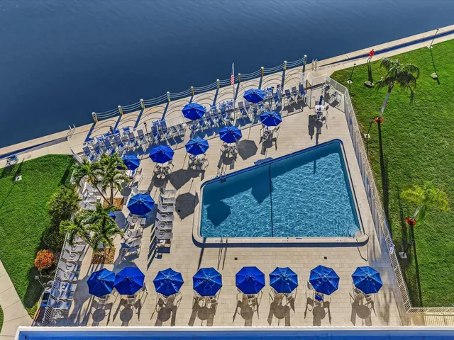 a view of swimming pool from a balcony