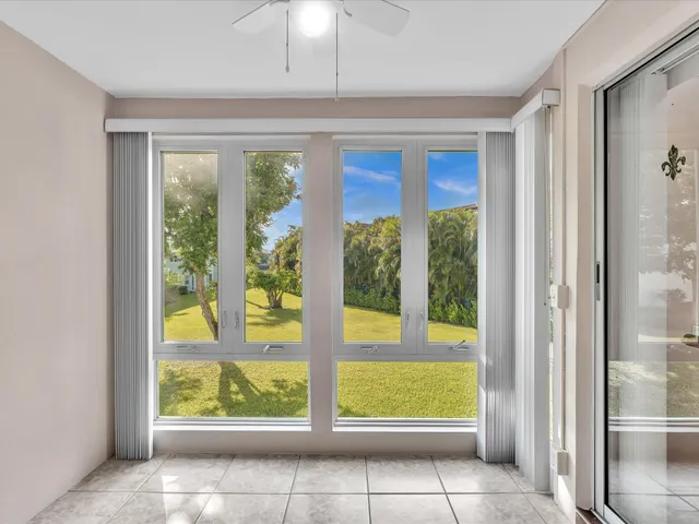 a view of a room with a large window
