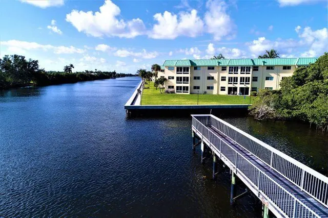 a view of a balcony with ocean view