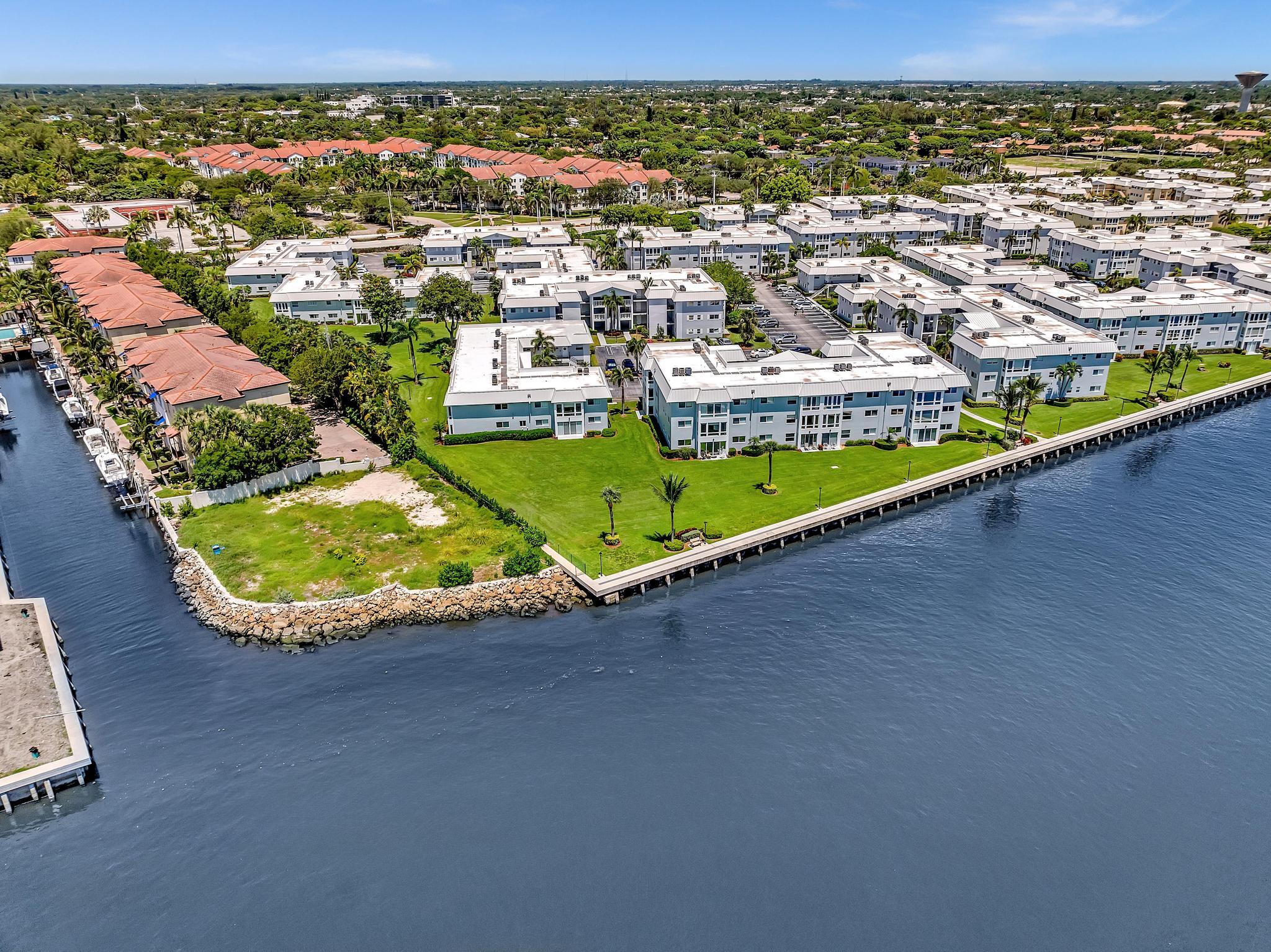 33 Colonial Club Drive, Unit 203 Boynton Beach, FL 33435 - Photo 48 of 61 an aerial view of residential houses with outdoor space and ocean view