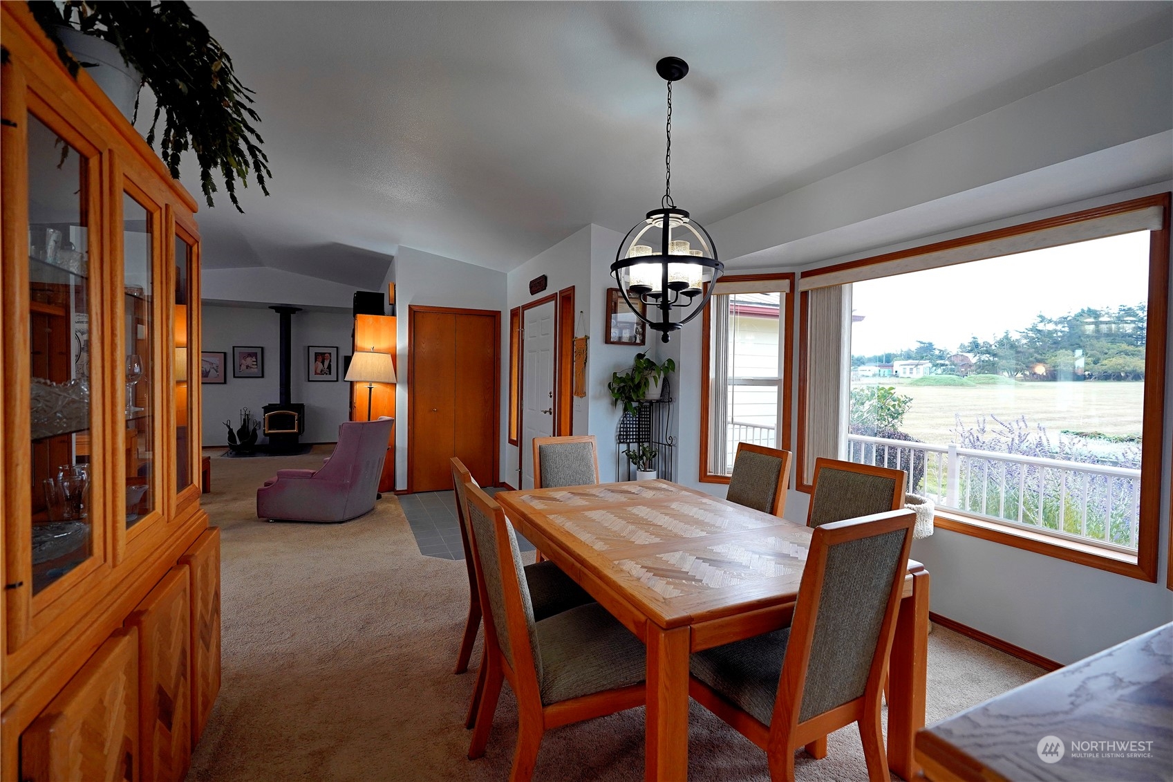 123 East Anderson Road Sequim, WA 98382 - Photo 15 of 40 a view of a dining room with furniture window and outside view