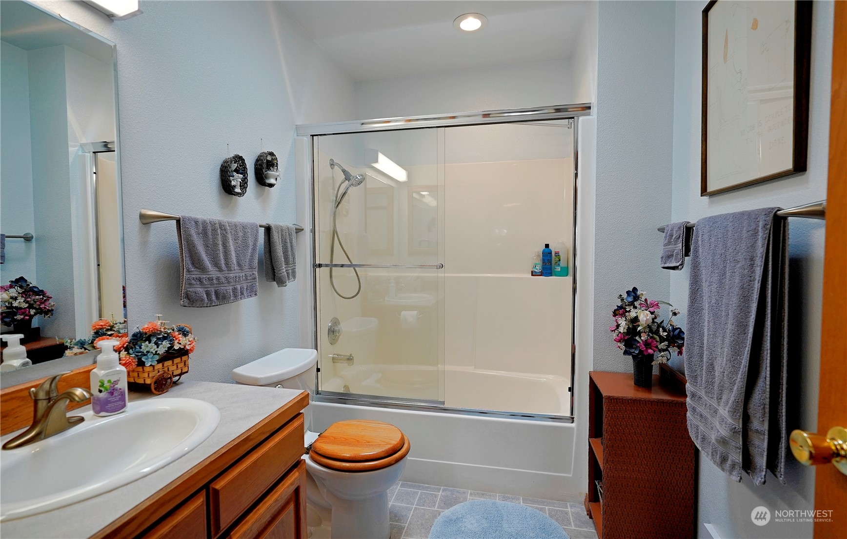 123 East Anderson Road Sequim, WA 98382 - Photo 28 of 40 a bathroom with a sink toilet and shower