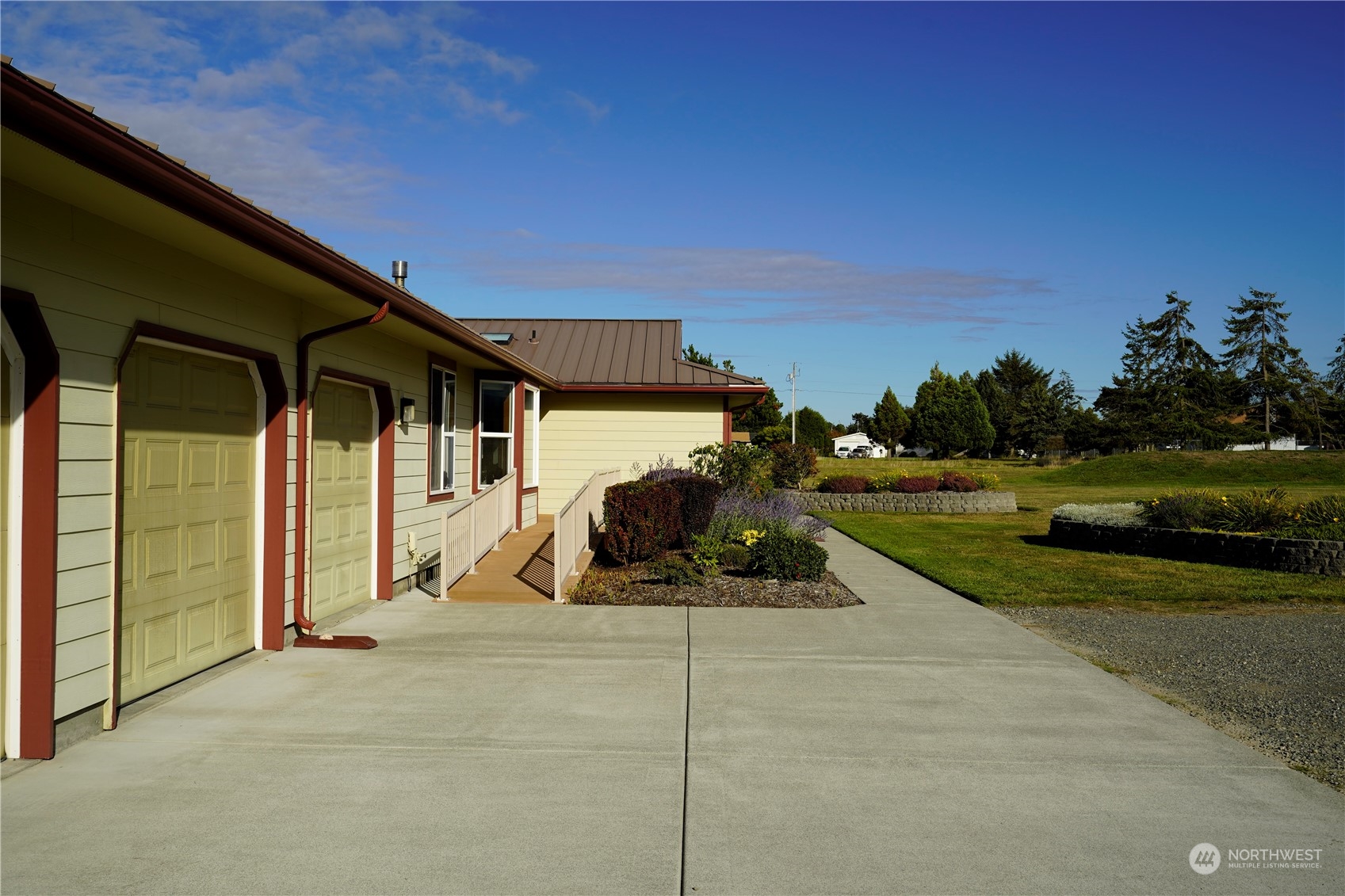 123 East Anderson Road Sequim, WA 98382 - Photo 39 of 40 a view of a house with backyard and trees in the background